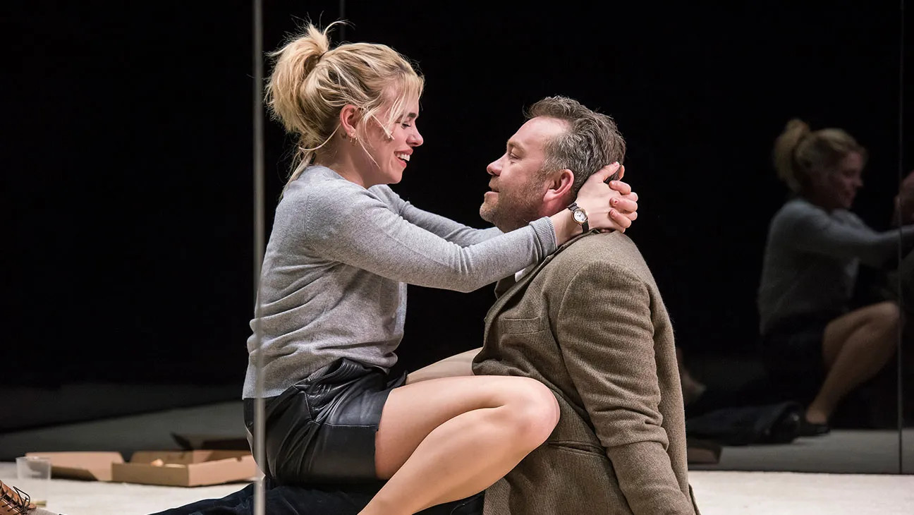 Her (Billie Piper) and John (Brendan Cowell) at the start of the play. Photo by Stephanie Berger.